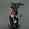 Bioninė roboto ranka su spyruokliniu mechanizmu
