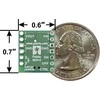 Mini MOSFET jungiklio dydžio palyginimas su moneta