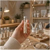 Plastikinis butelis su metaliniu dangteliu 30ml - mėginio buteliukas