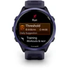 Išmanusis laikrodis Garmin  Forerunner® 570 - 47mm, Indigo spalvos aliuminis su permatomu imperinės rožinės / indigo spalvos dirželiu