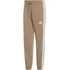 Kelnės moterims adidas Essentials 3-Stripes French Terry Cuffed smėlio sp. KF8338 (XL)