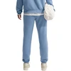 Kelnės moterims Nike Studio Fleece jasnoniebieskie IM8076 486 (L)
