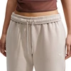 Kelnės moterims Nike Studio Fleece kremowe IM8076 236 (M)