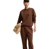 Kelnės moterims Nike Studio Fleece Medium Weigh ruda IM8078 259 (S)