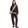 Kelnės moterims Puma Her Comfort Pants Fl ciemnobrązowe 694032 33 (L)