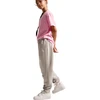 Kelnės vaikams Nike Sportswear Studio Fleece smėlio sp. IM4905 211 (M)