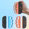 JYS 2x Bokserski laikiklis JYS-NS2298, skirtas Joy-con Nintendo Switch 2 / NSW2 / Fitness Boxing, mėlynas - oranžinis (SB11089)