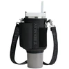 Stanley Termo puodelio su šiaudeliu dėklas &bdquo;The All-Day Quencher Carry-All&ldquo; 0,89 l, juodas
