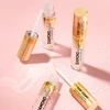 Eveline Cosmetics Diamond Glow Lip Luminizer viršutinis sluoksnis 12 su auksinėmis dulkėmis, 4,5 ml
