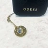 Guess GUCPMHGLD virvelė telefonui Heart Diamond Charm with Rhinestones