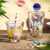 Leonardo Stiklinė su dangteliu ir lėkštute 300 ml dinozauras BAMBINI AVVENTURA -