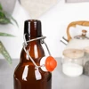 Lumarko Orion stiklinė butelka su segtuku 340 ml - tamsi