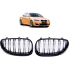 BMW E60 dvigubos blizgios juodos grotelės
