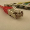 NETRACK BZPAT2FR pataisomasis kabelis RJ45 be kliūčių Cat 5e FTP 2m raudonas