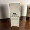 „Origins Pretty In Bloom“ ilgai išliekantis kreminis makiažo pagrindas „710 Very Deep Cool SPF 20“, 30 ml
