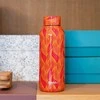 Quokka Solid - Nerūdijančio plieno dvigubas sienelės vakuuminis vandens butelis, nešiojamas termosas 510 ml (Oranžinis Bloom)