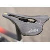 Selle Italia Siodło SELLE ITALIA SLR BOOST TEKNO SUPERFLOW S (id atitinka S3), anglies bėgis + 10 mm, anglis, 95 g (NAUJAS)