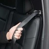 Spigen Tesla galinės sėdynės saugos diržo laikiklis, juodas - Tesla Model Y