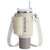Stanley nešiojimo dėklas skirtas The All-Day Quencher Carry-All 1.18L termo puodeliui su šiaudeliu, kreminės spalvos