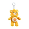 CARE BEARS Prisegamas pliušinis herojus kapsulėje, 15 cm