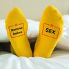 Kojinės su spauda ant padų "Remove before sex"