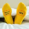 Kojinės su spauda ant padų "Remove before sex"