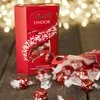 "LINDT LINDOR" pieninio šokolado rutuliukai, 200g