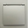 Tope Lighting Pilkas kištukinis lizdas su dangteliu IP44 "BORA" (su įžeminimu, be rėmelio)