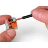 WAGO spyruoklinė jungtis 2x0,14-4 mm². Skaidraus plastiko, su oranžiniais skirtukais, be varžtų, be halogenų. LIZDINĖJE PAKUOTĖJE 16 vnt.