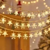 Christian Dior Kalėdinė LED girlianda snowflake/star - 6m/40 lampek ciepłe balta/warm baltas zasilane bat. 3xAA EHD-LS05
