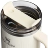 Stanley Thermos mug with straw The Quencher H2.0 Fluted Tumbler 1.18L in glossy cream color