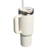 Stanley Thermos mug with straw The Quencher H2.0 Fluted Tumbler 1.18L in glossy cream color