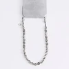 UNIQ Coehl Candy Gem Handstrap universali virvelė skirta telefonui ant rankos sidabro spalvos