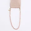 UNIQ Coehl Candy Gem Handstrap universali virvelė skirta telefonui ant rankos rožinės spalvos candy