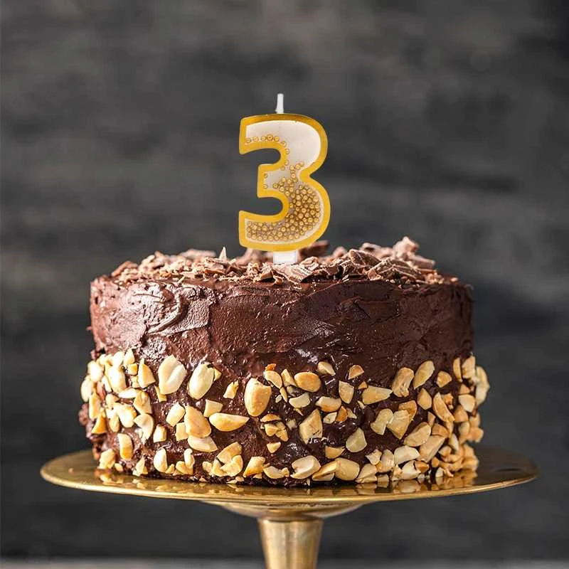 Auksinė žvakutė tortui skaičius "3"