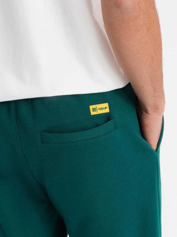 Unisex laisvalaikio žalios kelnės Argan