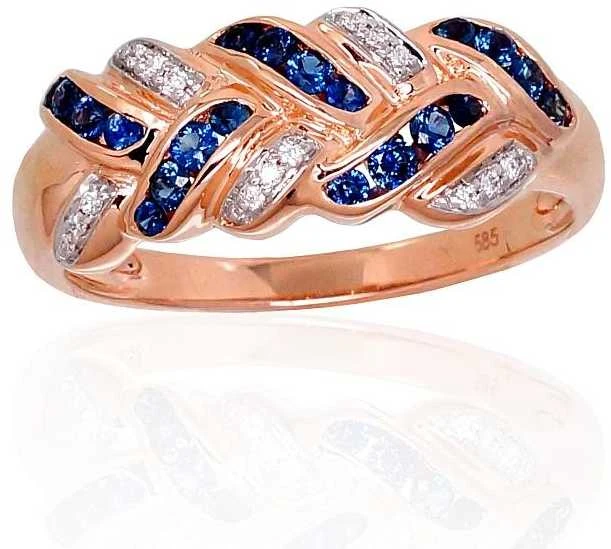 Auksinis žiedas su brangakmeniais. Metalas: Raudonas Auksas. Praba: 585°. Akmuo: Briliantai , Safyras - 18 - 3.06 g. - Briliantai (0,04Ct), Safyras (0,353Ct)