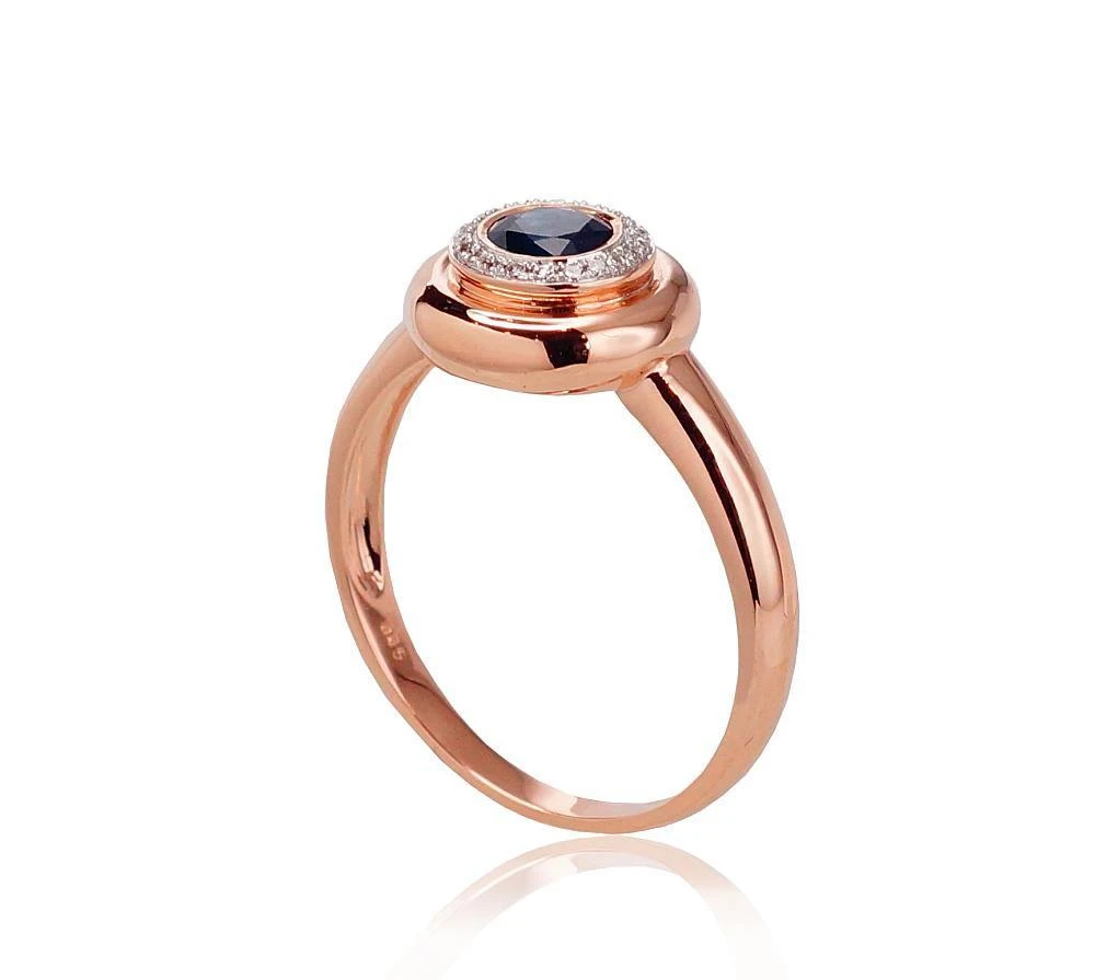 Auksinis žiedas su brangakmeniais. Metalas: Raudonas Auksas. Praba: 585°. Akmuo: Briliantai , Safyras - 18.5 - 3.97 g. - Briliantai (0,052Ct), Safyras (0,673Ct)