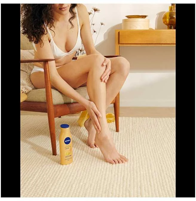 Nivea Q10 Firming + Bronze Losjonas kūnui moterims, 400 ml