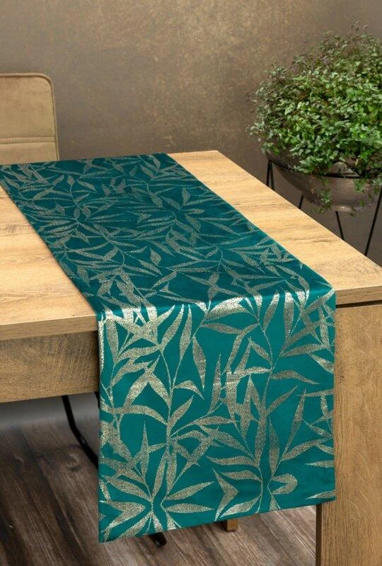 Eurofirany BLINK / 15 Aksominis stalo takelis su subtiliu šviesiai auksiniu šakelių motyvu, 35X180 cm, spalva: tamsi turkio