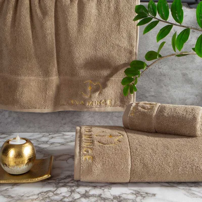Eurofirany Medvilninių rankšluosčių rinkinys dėžutėje, 3 dalys, 550 g/m², veliūrinis apvadas, siuvinėtas logotipas, rankšluostis rankoms, vonios rankšluostis, didelis rankšluostis, dovana voniai