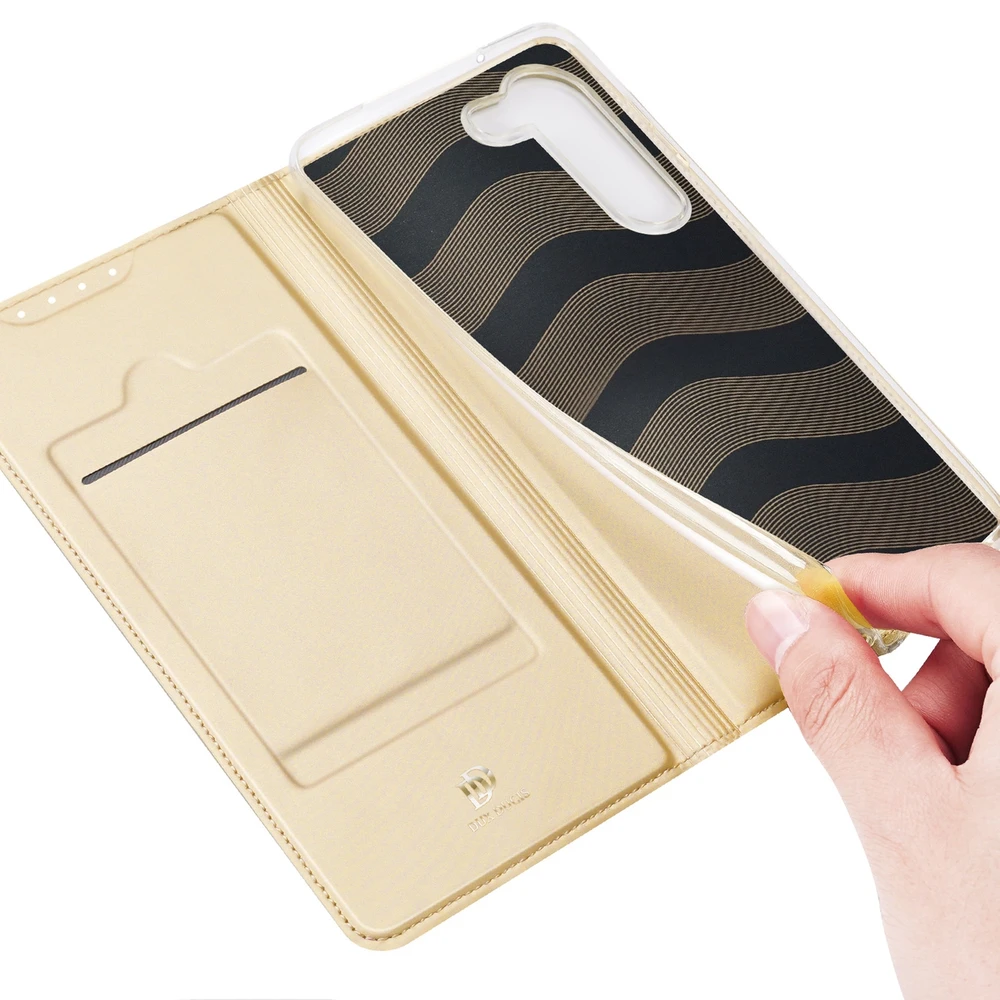 Dėklas Dux Ducis Skin Pro Samsung Galaxy S23 Plus atverčiamas Card Wallet su stoveliu Gold