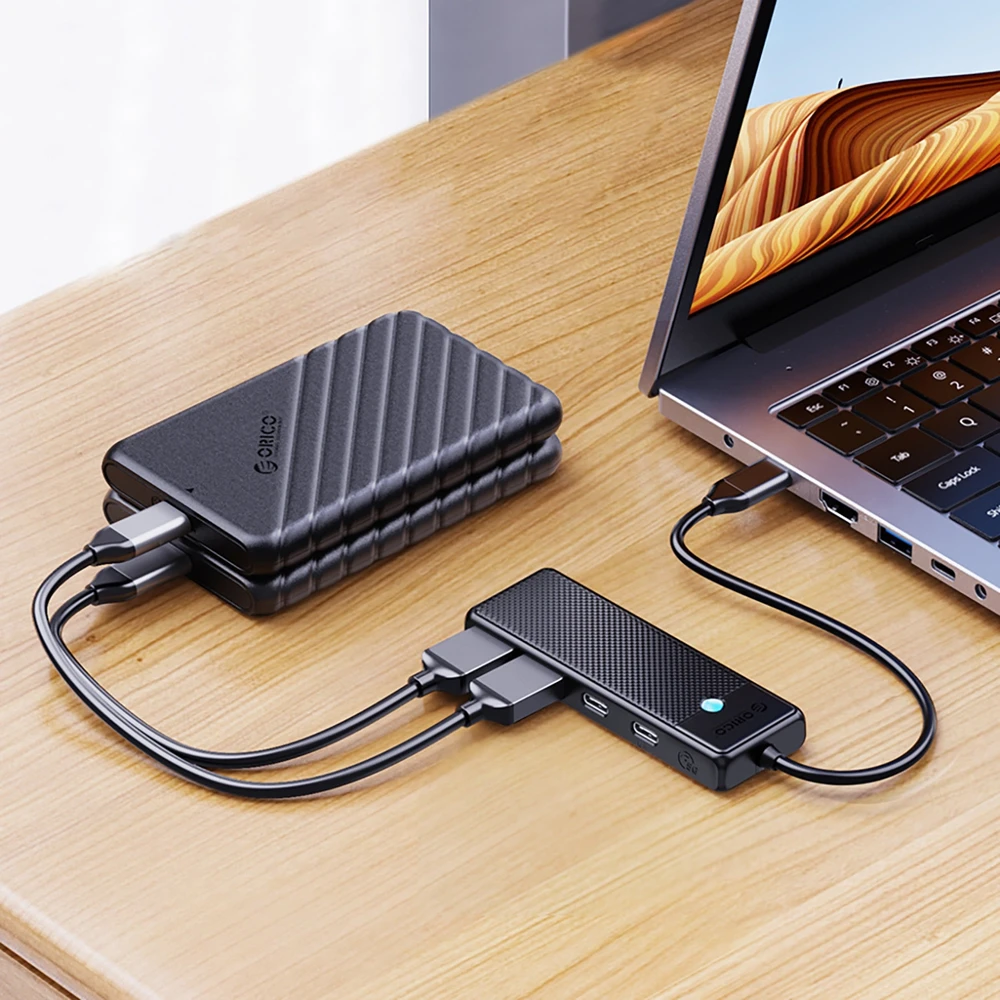 USB-C šakotuvas „Orico PAPW2AC-C3“ su 2 USB-A 3.0 + 2 USB-C 3.0 jungtimis, juodos spalvos