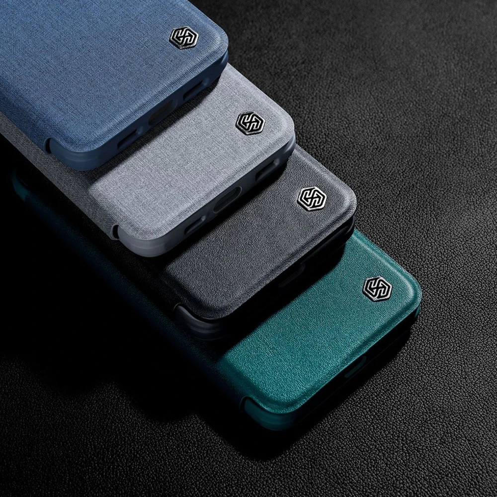 Nillkin Qin Leather Pro Apple iPhone 14 Plus Camera atverčiamas dėklas telefonui žalios spalvos