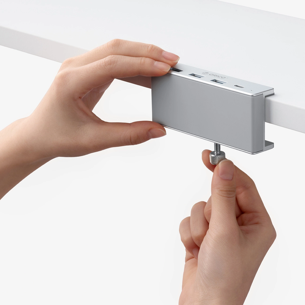 „Orico MH4PC“ šakotuvas, montuojamas ant spaustuko, USB-C / 3x USB-A 3.0 + 1x USB-C 3.0 – dvigubos spalvos