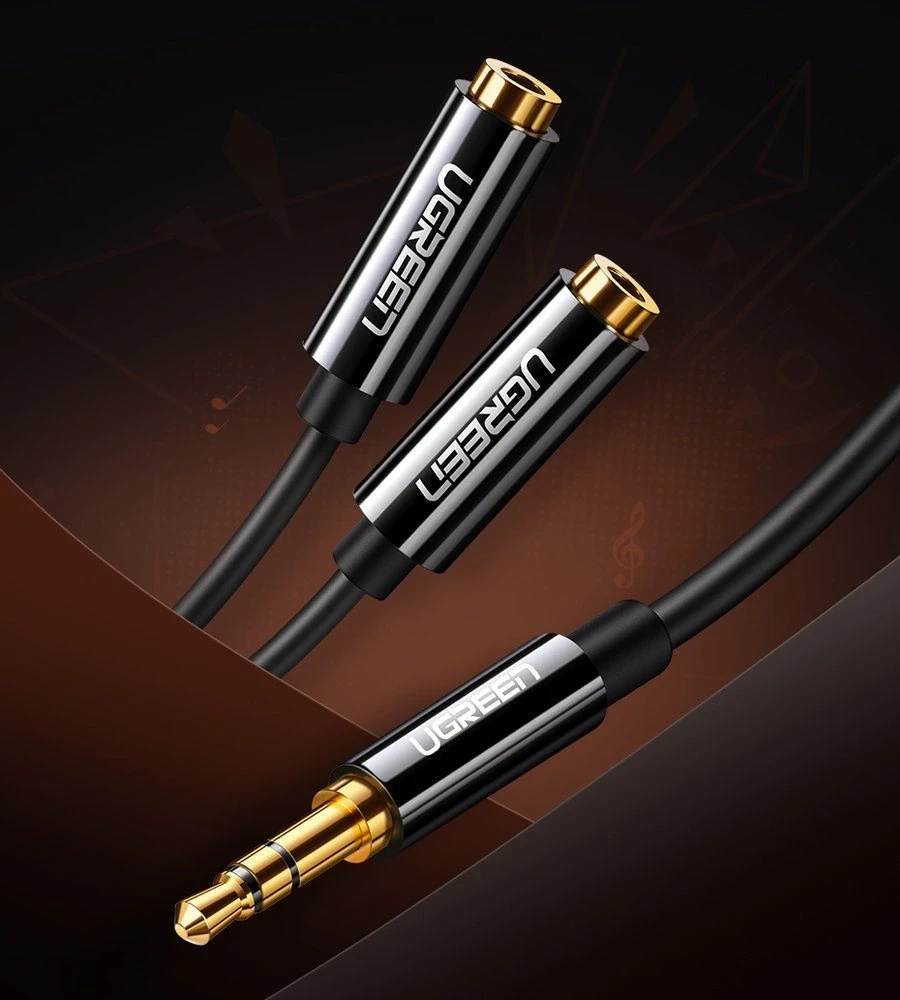 UGREEN AV123 AUX 3.5mm kištukas - 2x 3.5mm lizdai kabelis 0.25m juodas