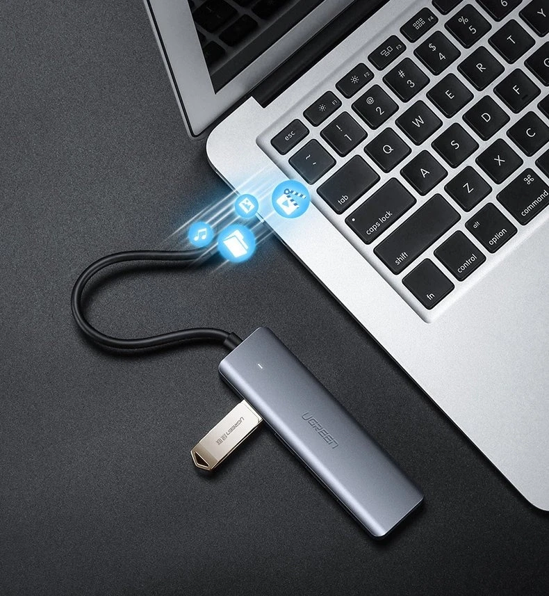 4-in-1 adapteris UGREEN USB Hub prie 4x USB 3.0 + USB-C (pilka)