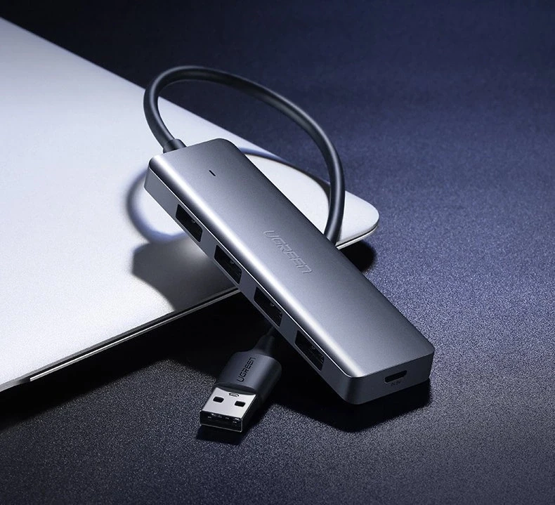 4-in-1 adapteris UGREEN USB Hub prie 4x USB 3.0 + USB-C (pilka)
