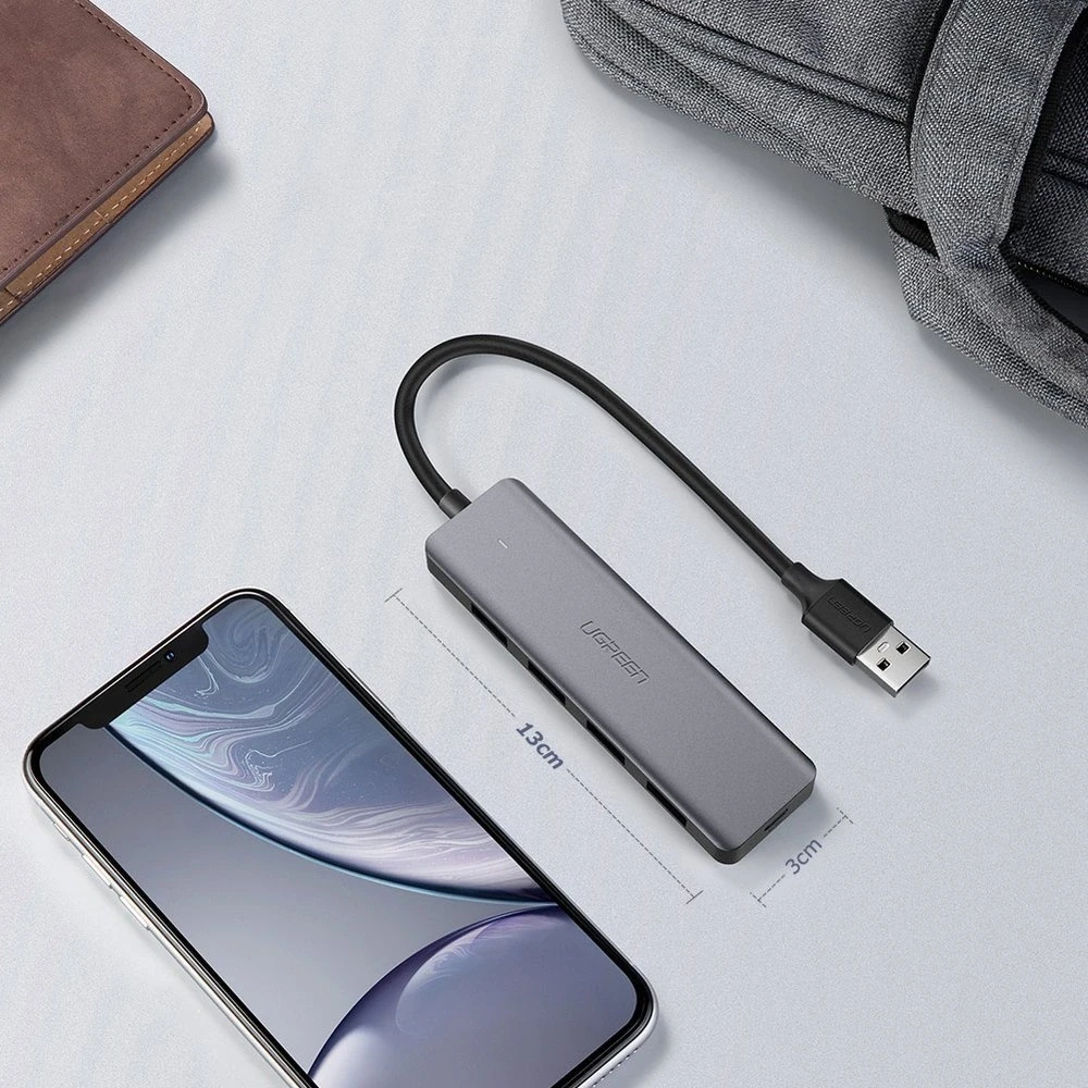 4-in-1 adapteris UGREEN USB Hub prie 4x USB 3.0 + USB-C (pilka)