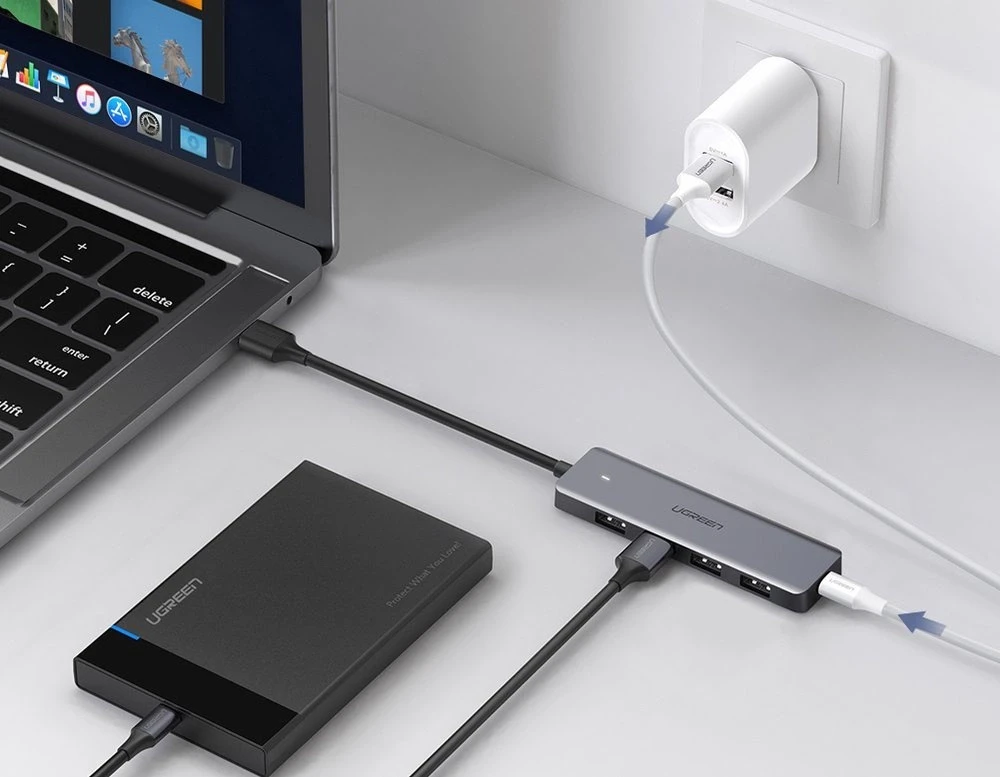 4-in-1 adapteris UGREEN USB Hub prie 4x USB 3.0 + USB-C (pilka)
